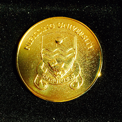 Students earn academic achievement medals