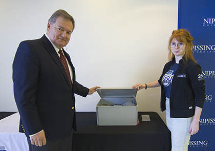 NU seals lid on 25th Anniversary with time capsule